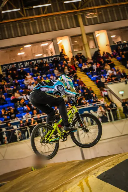 Indoor race in front of a packed stand